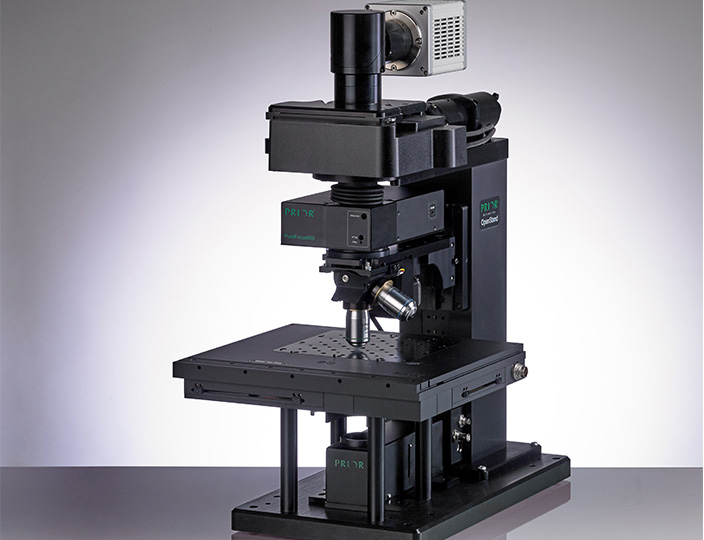 A black OpenStand upright modular imaging system against a grey background.